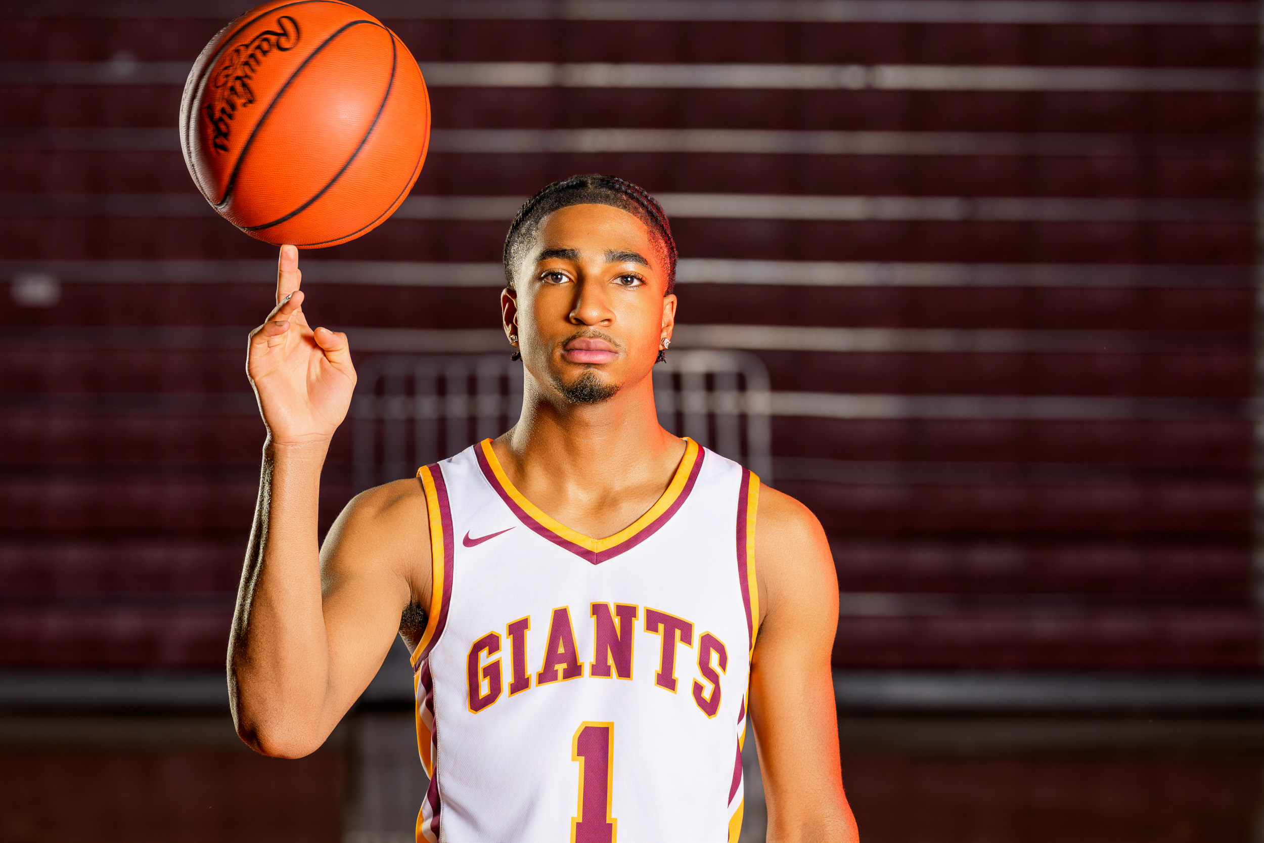 Creative basketball senior portrait with ball movement