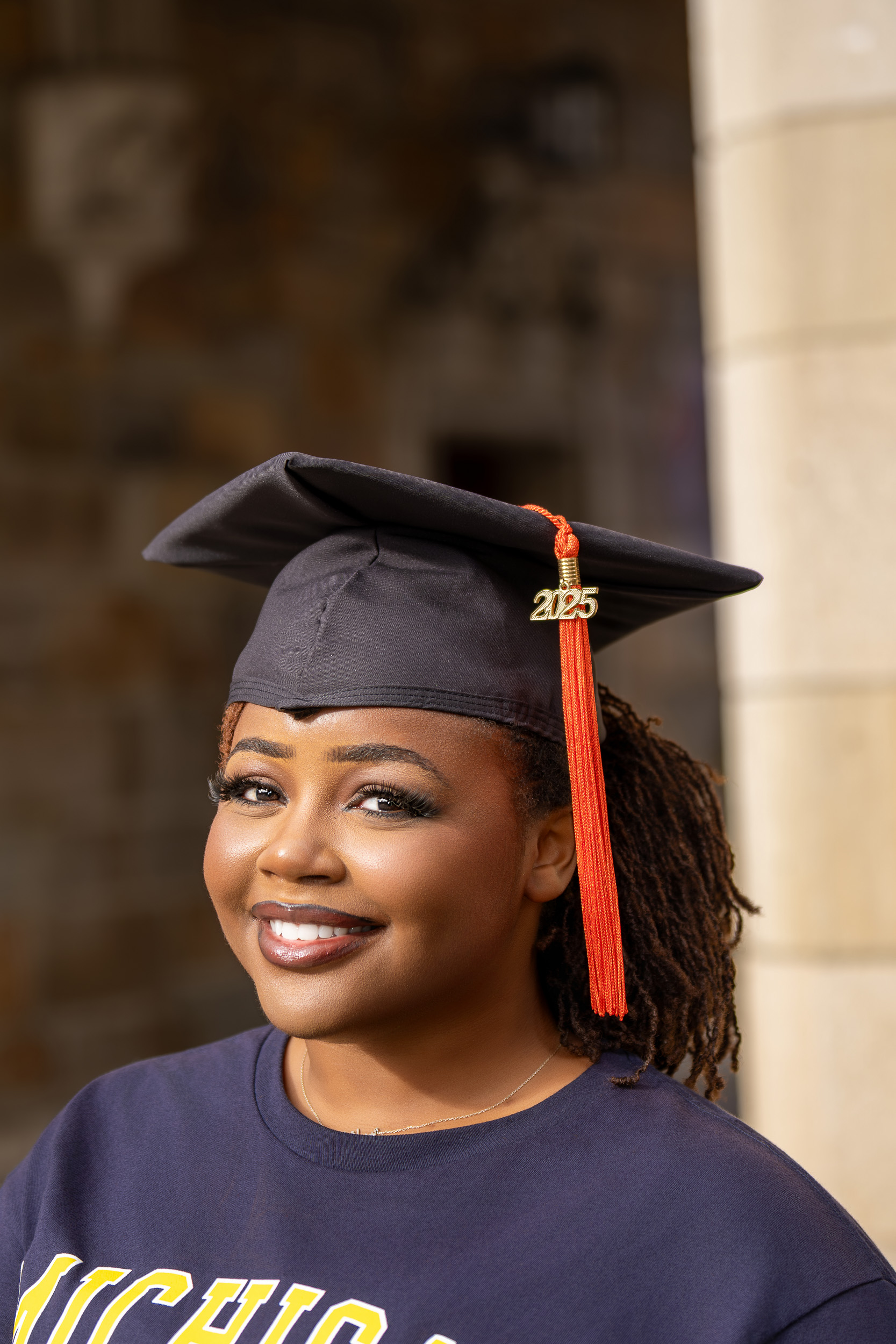 Graduate portrait photographed by EyesOpen Photography