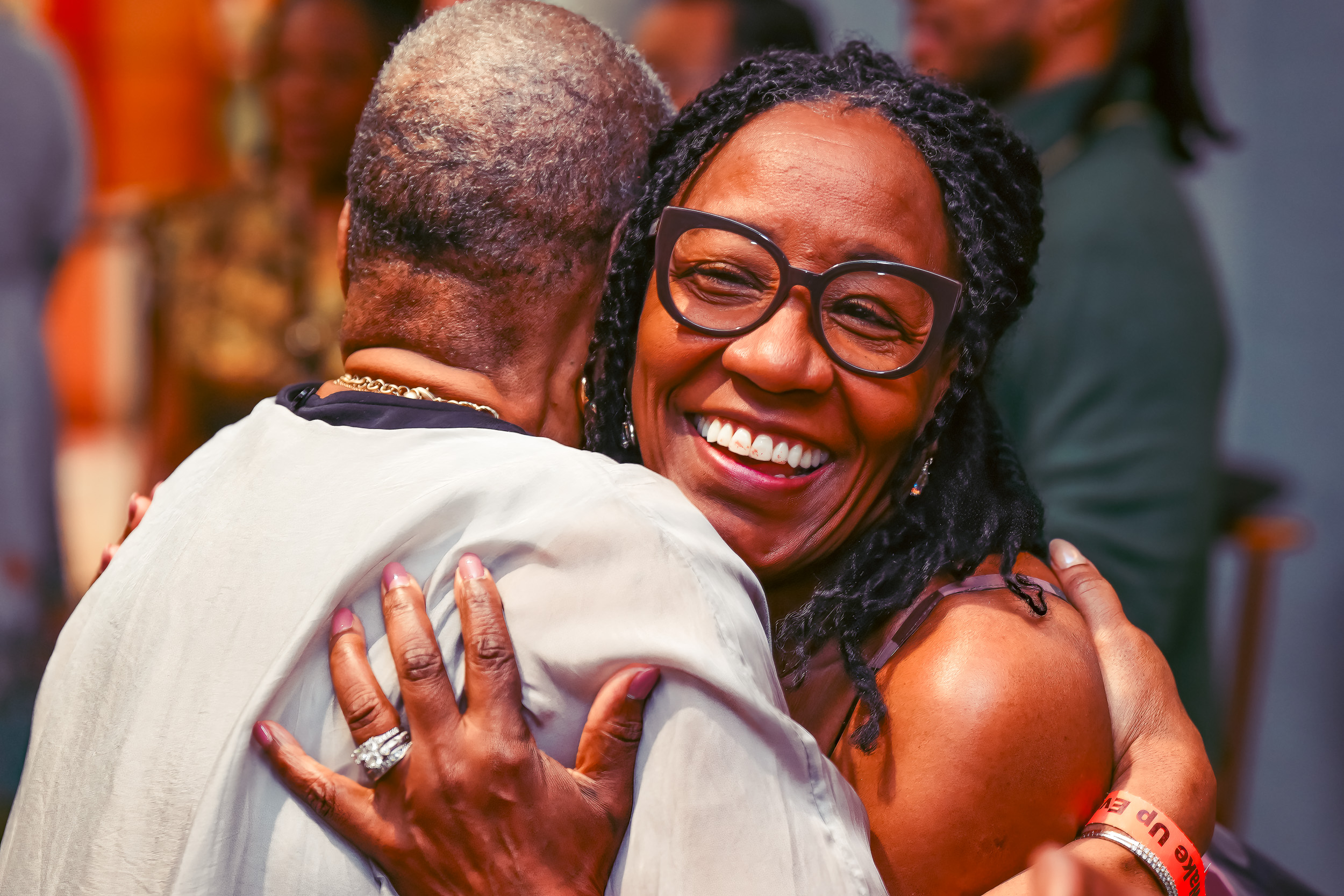 Warm guest interaction at a nonprofit gala